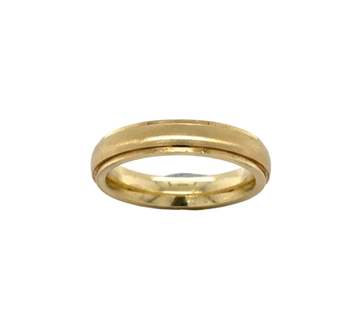 Gold ring on a white background