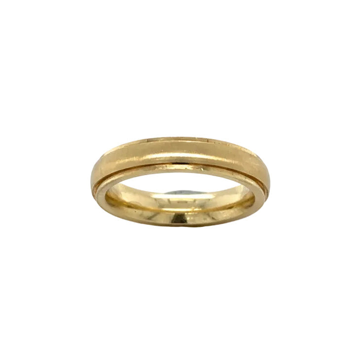 Gold ring on a white background